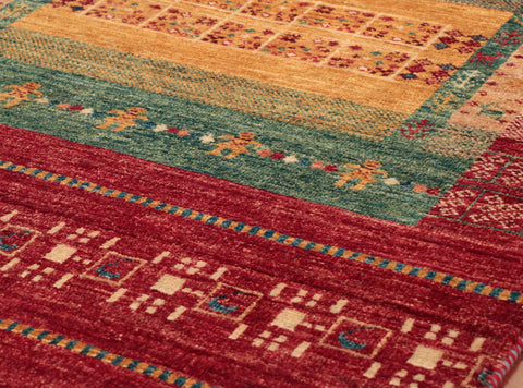 The colours in this Afghan Loribaft are very bright and vibrant, giving off an almost playroom impression