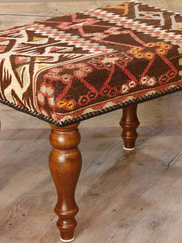 Turkish kilim covered stool in browns, cream and soft red colourings 51 x 36cm	1'8 x 1'2