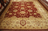 Large central section in russet red with a warm cream border.  The decoration is highly floral using the original colour palette and an additional one of blue, and a warm fawn shade. 
